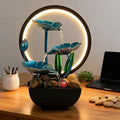 AOZITA Tabletop Fountain, Indoor Waterfall Fountain, Small Home Décor Zen Relaxation Soothing Sound Machine for Office, Living Room, or Bedroom,Blue Metal Lotus with Bud, River Rocks,Round LED by Unknown