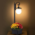 Solar Lamp Post Light with Planter and Globe Shade by YonaveilLighting