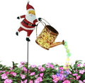 Christmas Solar Lights Santa Claus Watering Can Metal Stake Lamp by Unknown