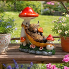 Highland Cow Solar Powered Outdoor Garden Statue Lying on Mushroom Hammock - Image 3
