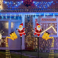 2 Pack Solar Christmas Lights Outdoor - Creative Santa Claus with Watering Can Solar Lights, Metal Waterproof Garden Stake Lights for Yard, Lawn, Patio, Pathway Holiday Decor (Warm White) by JOYWU